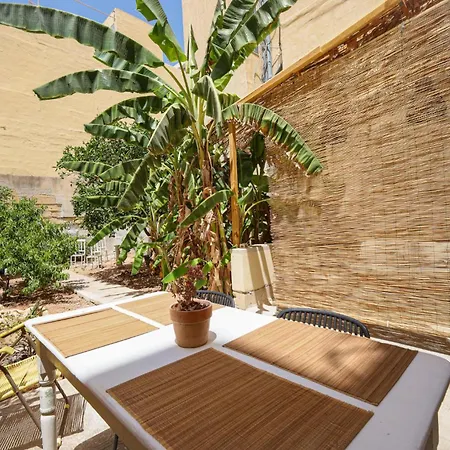 Traditional Maltese Townhouse With Backyard Garden And Seafront Location