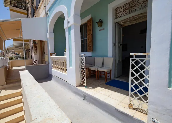 Traditional Maltese Townhouse With Backyard Garden And Seafront Location