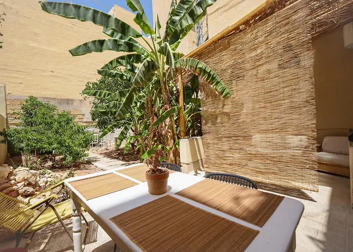 Traditional Maltese Townhouse With Backyard Garden And Seafront Location