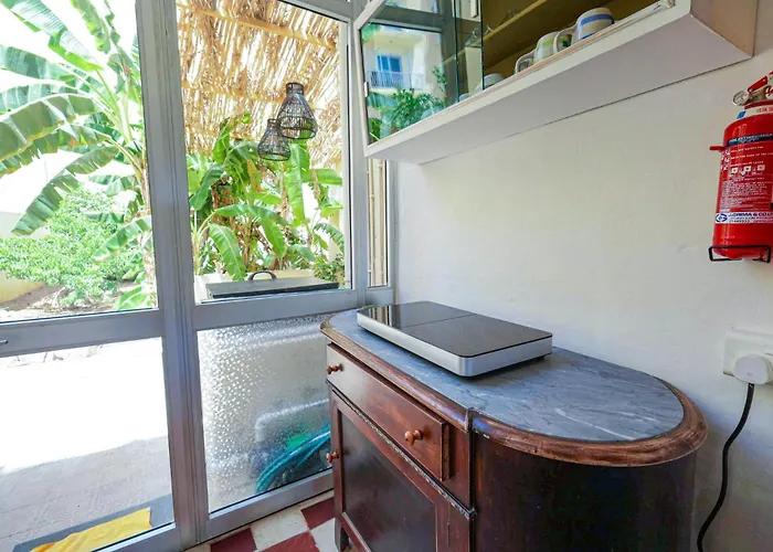 Traditional Maltese Townhouse With Backyard Garden And Seafront Location